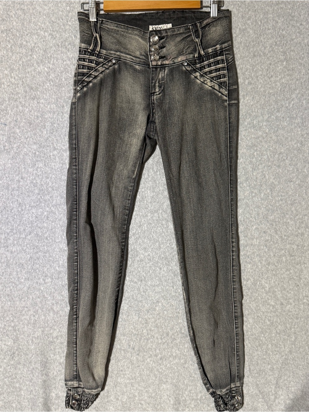 High-Rise Charcoal Skinny Jeans with Button-Front Detail